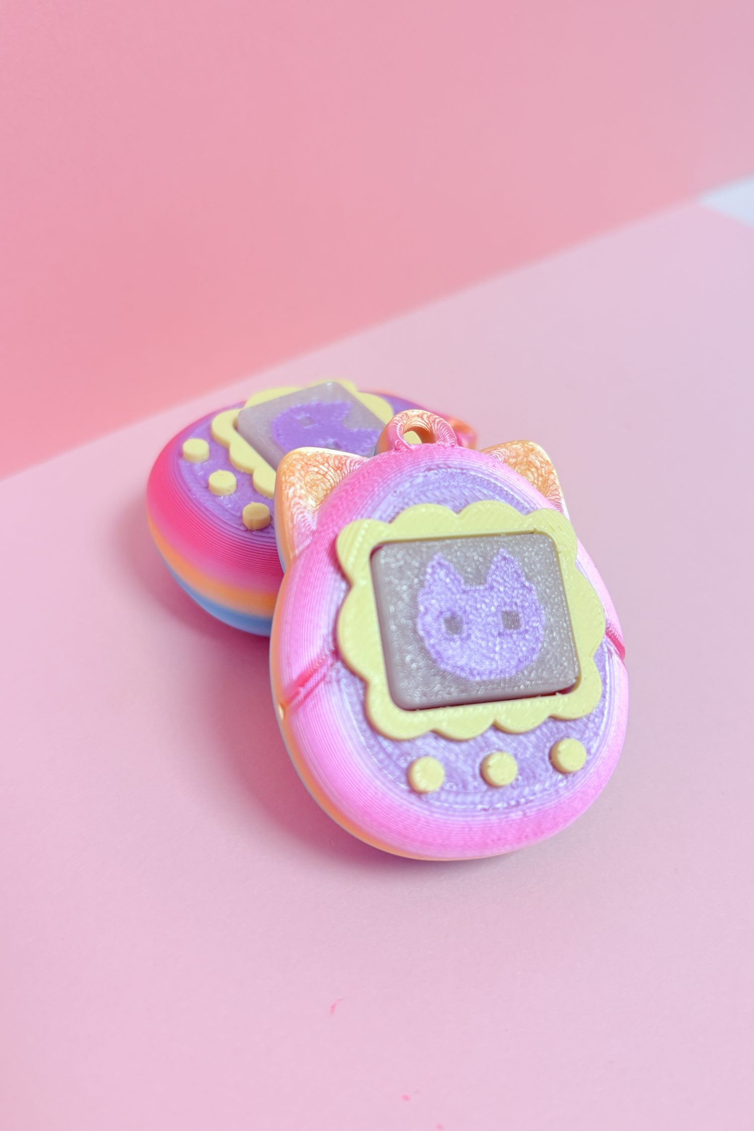 Clicker Tamagotchat Arc en ciel chat phosphorescent