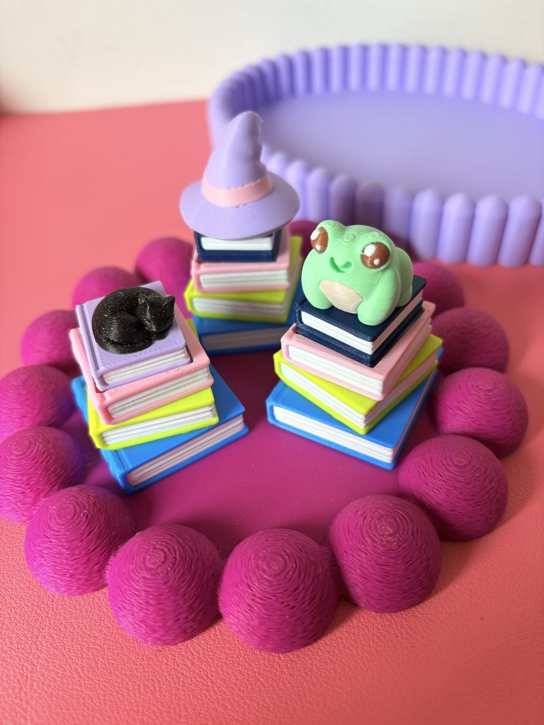 Cosy Clickers (grenouille/chat ou chapeau)