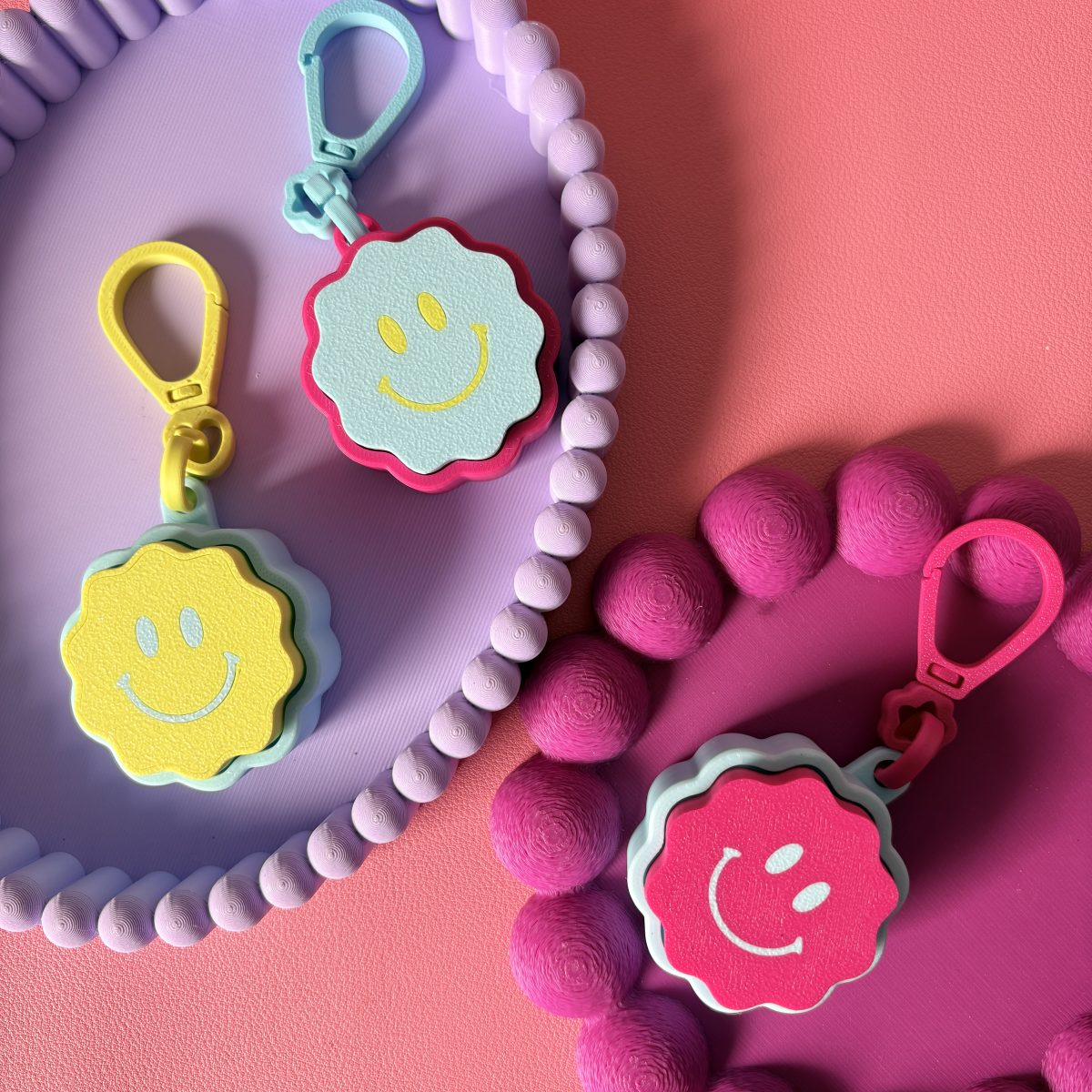 Clicker Smiley fleur mousqueton